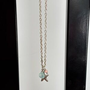 Starfish pendant necklace/ silver tone/ lobster clasp/ measures 18 in le…